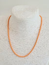 Neon orange enamelled metal necklace