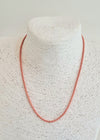 Pale orange enamelled metal necklace